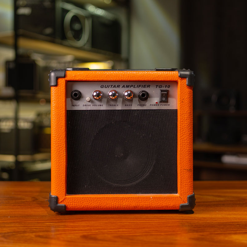 AM1048-pacoguitar-1 امپ گیتار الکتریک فندر Fender tg-10 orange - Image 1